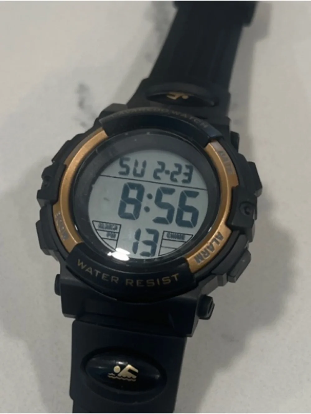 Black and Gold Digital Sports Watch with Water-Resistant Design